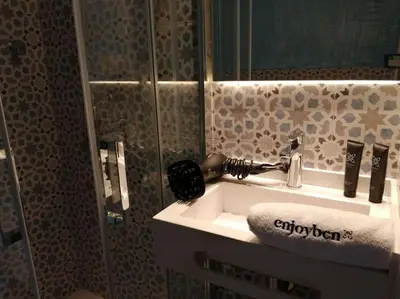 a bathroom with a sink and a mirror at Barceloneta Mar Street - BM11 in Barcelona