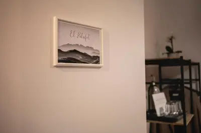 a picture of a mountain on a wall at Habitación El Patufet en Casa Camí de les Aigües Monistrol de Montserrat in Monistrol
