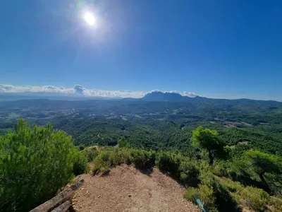 a view of the mountains from the top at QEhome - confort, parking y cargador EV en el centro de Manresa in Manresa