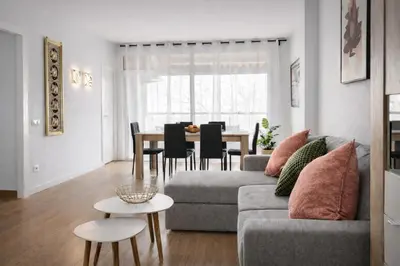 a living room with a couch and a table at Apartments BCN Central-Colon in Barcelona