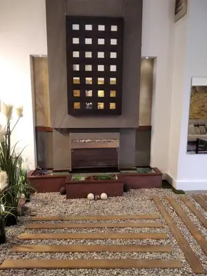 a fireplace in the lobby of a building at ApartEasy - MONUMENT, large, cosy apartment in Barcelona