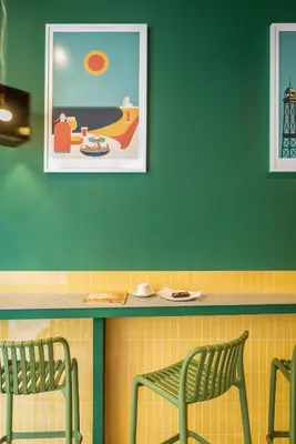 a room with two chairs and a picture on the wall at BYPILLOW Twenty in Barcelona