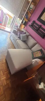 an overhead view of a living room with a white couch at Estudio, privado e independiente in Hospitalet de Llobregat