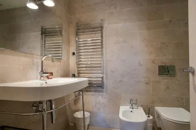 a bathroom with a sink and a toilet at Tendency Rambla Catalunya in Barcelona