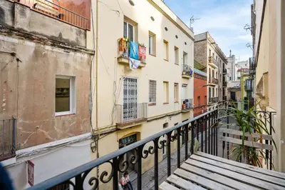 a view of an alley from a balcony of a building at Progres in Barcelona