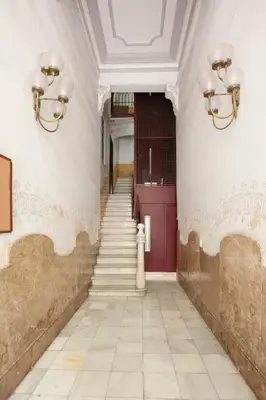 a kitchen with a washing machine and a sink at Gran Via modern and bright 3BD with terrace in Barcelona