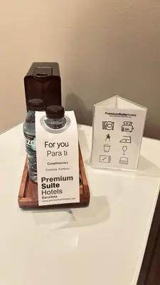 a table with a sign and a box on it at Acacia Suite in Barcelona