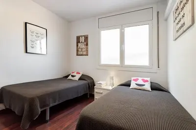 a bathroom with a shower and a toilet and a sink at Camp nou Apartamento in Hospitalet de Llobregat