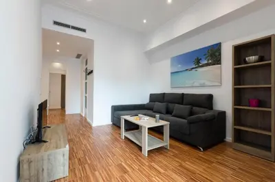 a living room with a couch and a table at 2905 - AB Comte dUrgell I-II in Barcelona