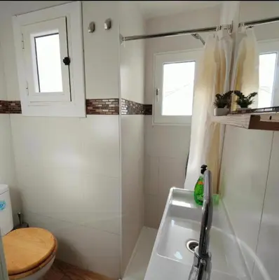 a small bathroom with a sink and a toilet at Bright and cozy 2 rooms apartment in Hospitalet de Llobregat