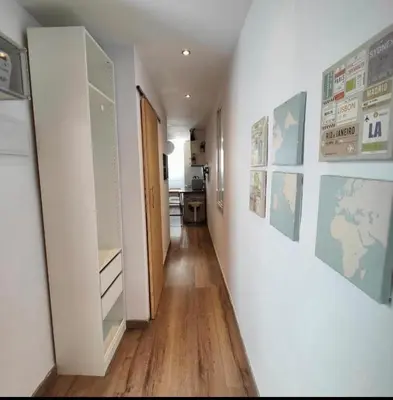 a hallway with a room with a hallway at Bright and cozy 2 rooms apartment in Hospitalet de Llobregat