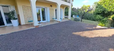 a house with a walkway to the front of it at SUITE Bougainvillea in Lliçà d'Amunt