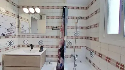 a bathroom with a sink and a shower at For Sea Lovers in Cubelles