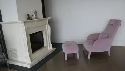 a living room with a chair and a fireplace at Casa o chalet independiente en venta en Sarrià in Sant Just Desvern