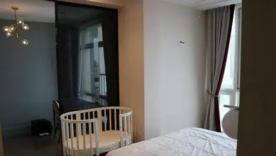 a bedroom with a bed and a mirror and a chair at Casa o chalet independiente en venta en Sarrià in Sant Just Desvern