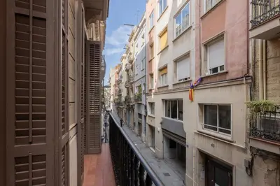 a view of an alley between buildings at ApartEasy - PURE GRACIA, excellent location in Barcelona