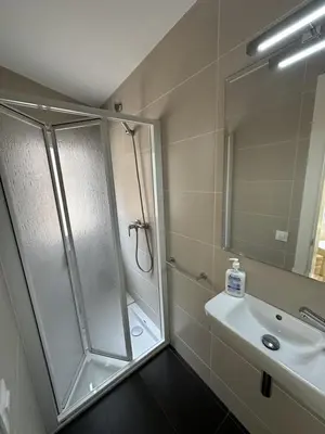 a bathroom with a shower and a sink at LEsglesia 1 in Arenys de Mar