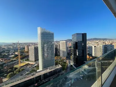 a view of a city from the top of a building at Piso luminoso en Hospitalet de Llobregat in Barcelona