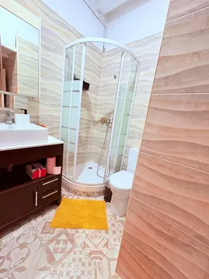 a bathroom with a shower and a toilet and a sink at Amazing and stylish flat for 4 people with breakfast included 2 blocks away from Poblenou beach in Barcelona