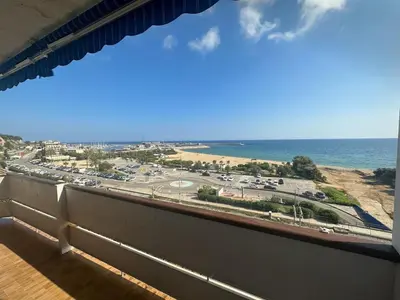 a view of the ocean from a balcony at Can Xifre 1 in Arenys de Mar