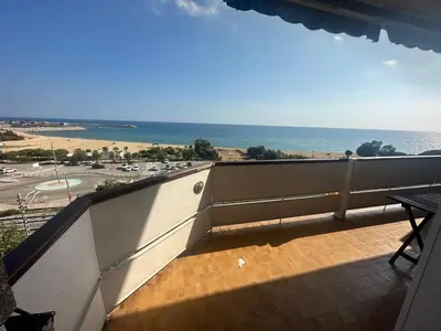 a balcony with a view of the ocean at Can Xifre 1 in Arenys de Mar