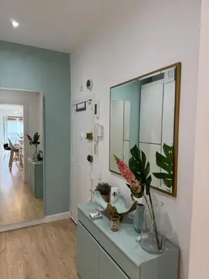 a mirror on top of a dresser in a room at Unique Ramblas in Barcelona