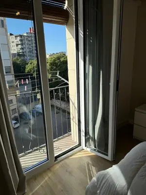 a room with a window with a view of a balcony at Unique Ramblas in Barcelona
