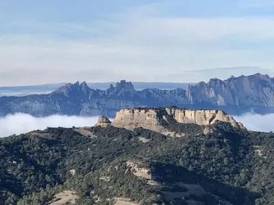 a view of the blue mountains from the air at Ca la Neus - Casa per 8 persones al poble de Mura in Mura