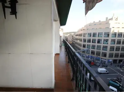 a balcony of a building with a view of a street at Ramblas Rentals Unique & Spacious Flat 4BR Terrace 20M Ramblas in Barcelona