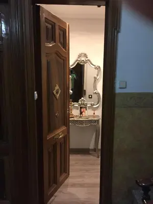 an open door to a bathroom with a sink at Vilamari 33 - 2 bedroom apartment in Barcelona