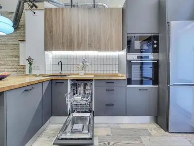 a kitchen with a dish washer in a dishwasher at Concordia - Beautiful flat, spacious, central 4 rooms , 2 bath in Barcelona