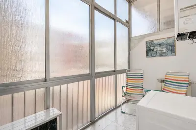 a hallway with white walls and a wooden floor at 5BR for 7 Elevator Walk to Sant Antoni in Barcelona