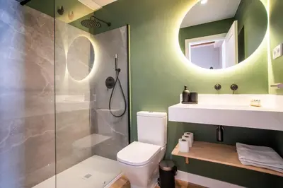 a bathroom with a shower and a toilet and a sink at E2MAL1052 - Fantastic apartment next to Sagrada Fa in Barcelona