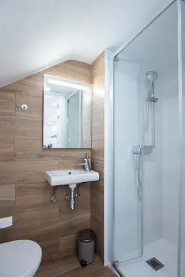 a bathroom with a sink and a shower at Casa Jasmine Family Villa near the beach in Barcelona