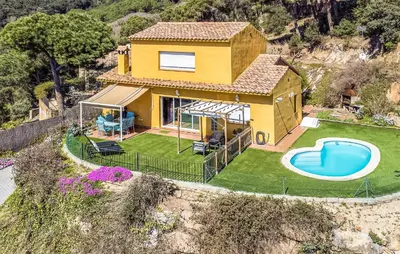 an aerial view of a house with a swimming pool at Stunning Home In Arenys De Munt in Arenys de Munt