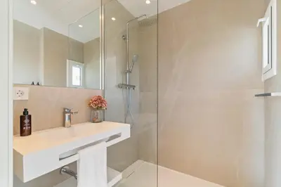 a bathroom with a sink and a shower at L'Hostalet de Cabrils in Cabrils