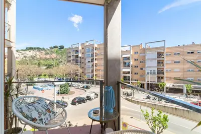 a balcony with chairs and a view of a street at Mediterranean Soul Experience in Montgat
