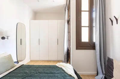a bathroom with a shower with a sink and a mirror at Canela Homes MIDTERM D'EN SERRA in Barcelona