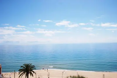 a view of the ocean from a beach at Waves and sky in Montgat