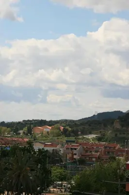 a view of a city with buildings and trees at Alojamiento luminoso y bien ubicado en Terrassa Barcelona in Terrassa