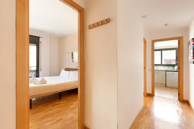 a bedroom with a bed and a mirror at Stay U-nique Apartments Bonsoms in Barcelona