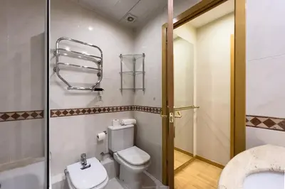 a bathroom with a toilet and a sink at Gran Vía Sun in Barcelona