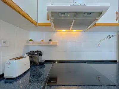 a bathroom with a sink and a toilet at Beachfront gateway in Pineda de Mar in Pineda de Mar