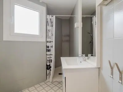 an empty room with an open door in a garage at Large townhouse in St Cugat in Sant Cugat del Vallès
