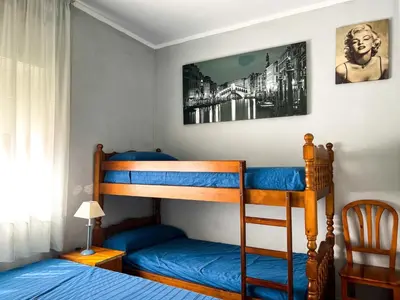 a bedroom with a bunk bed and a bunk bed at Tranquil Villa with Private Pool & views in Sant Cebrià de Vallalta