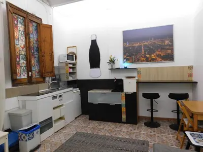 a kitchen with a sink and a counter top at A pasos de la playa en Barcelona! in Barcelona