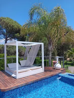 a swimming pool with avisorvisorvisorvisor at El Desmai in San Pol de Mar