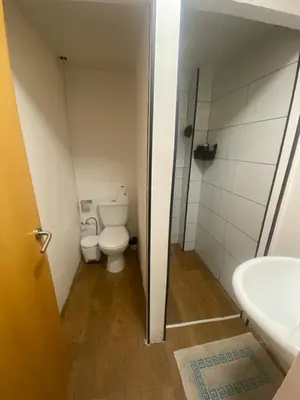 a small bathroom with a toilet and a sink at Barcelona Home in Barcelona