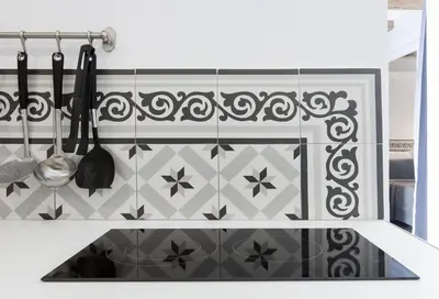 a kitchen with a sink and utensils at Aspasios Charming Flats in Barcelona