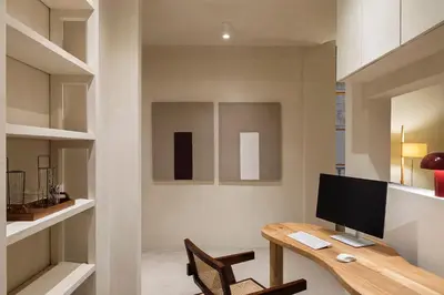 a home office with a desk with a computer on it at The Boulevard by Aspasios in Barcelona